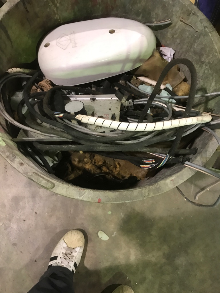 Old antenna in the garbage can